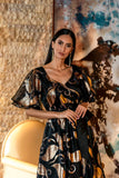 Golden Leaf gown labels one of the Pre-Fall masterpiece. It is crafted from silk-organza fabric for a loose fit with half sleeves and classic black belt perfectly highlighting the waistline. This dress will turn heads wherever you go. It is cut to a sophisticated silhouette that features the beauty of the neck.