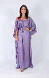 Sequinned kaftan embellished with silk fabric on the neckline. Comes with removable belt made from satin fabric