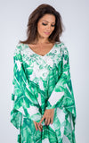 Kaftan with lace on the neck line.