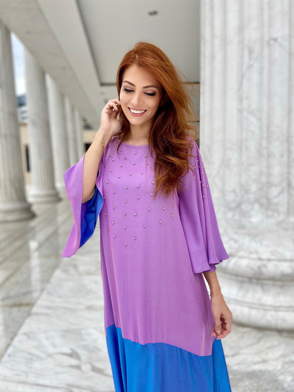 This elegant contrast bell sleeve kaftan embellished with crystals. This kaftan is made from luxurious crepe gathered to give it a gentle flow effect so you can roam around freely. This masterfully tailored kaftan offers a modest evening wear option.