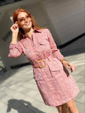 Shirt dress with flap patched pockets is 100% linen. Botton closures down front. Comes with removable belt.