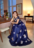 Royal Blue gown combines lady-like elegance, with metallic-gold brocade embellishments. A round neckline compliments the magnified short sleeves. A floor-skimming length makes for an outfit ready to take on the evening.