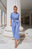 Playful but ready to take care of business Natural Linen Jumpsuit is work-appropriate and easy to dress up or down. Features shell buttons, side pockets and removable belt.  