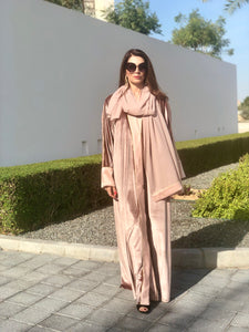 Velvet abaya with crepe satin borders and golden threads. Comes with sheila