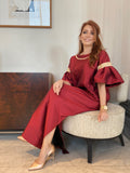 Kaftan-Dress features sequin details on a round neckline and puffy sleeves 