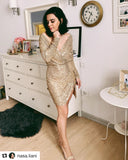 Shimmering Dress is a girl's dream dress. Drenched in gold sequins with slit on the side. This high-voltage dress features a modest, yet elegant silhouette. Fully lined. 